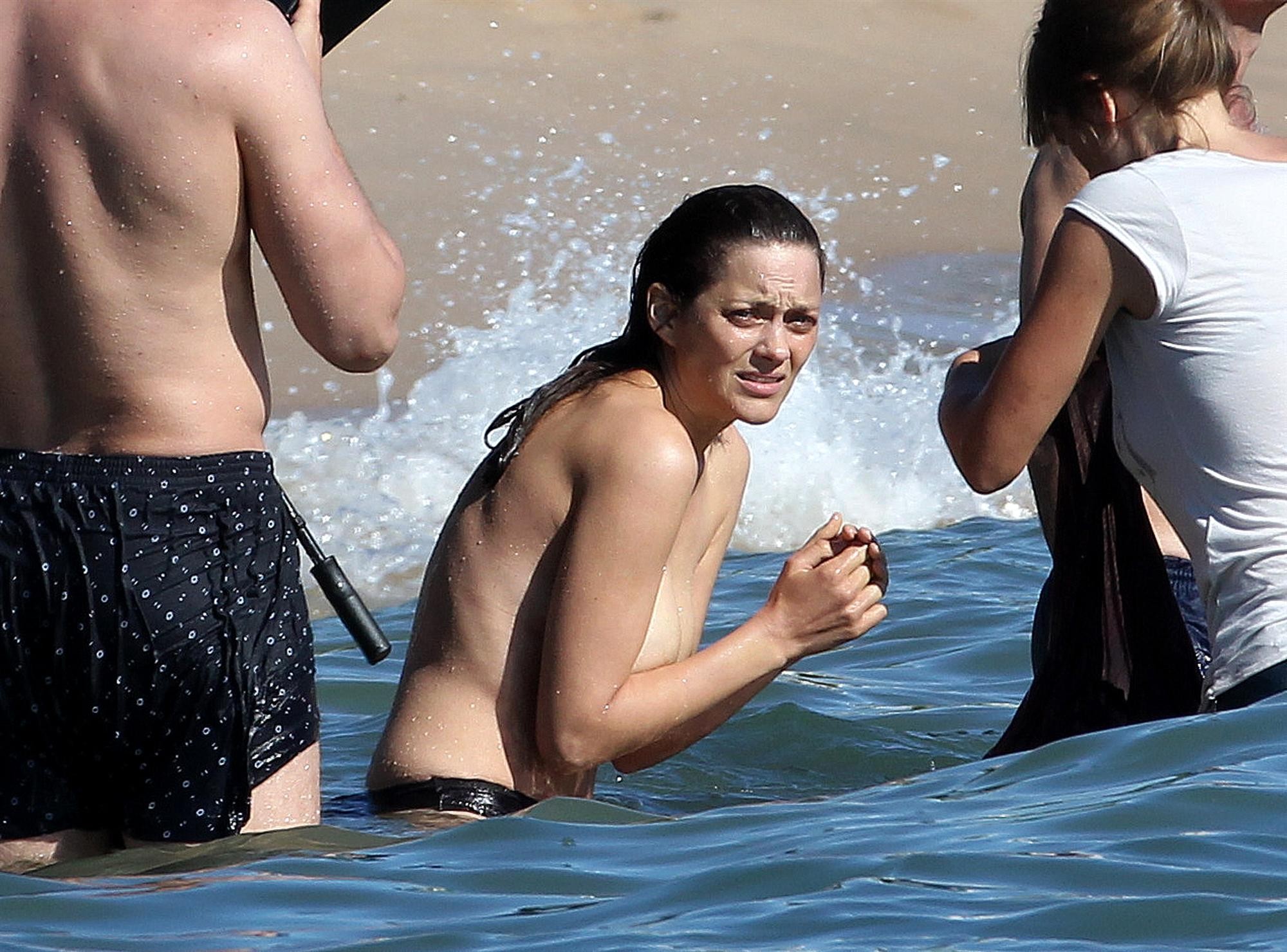 Marion Cotillard showing off her big boobs on the set of 'Rust and Bone' in Cann #75285741