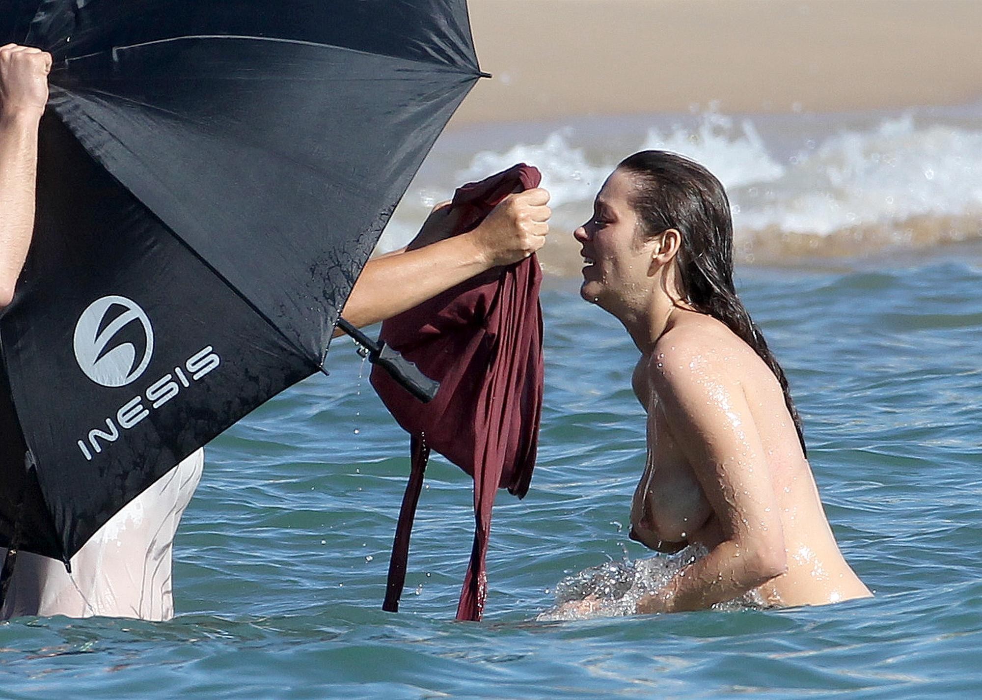 Marion Cotillard showing off her big boobs on the set of 'Rust and Bone' in Cann #75285770