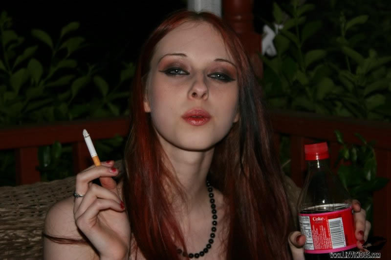Redhead goth teen strips in the movie theater #76640409