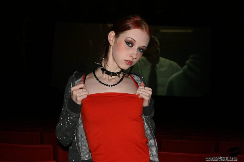 Redhead goth teen strips in the movie theater #76640412