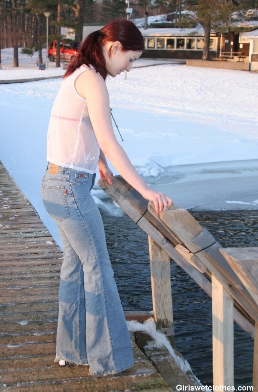 Hot redhead takes a cold iceswim with clothes on #76644448