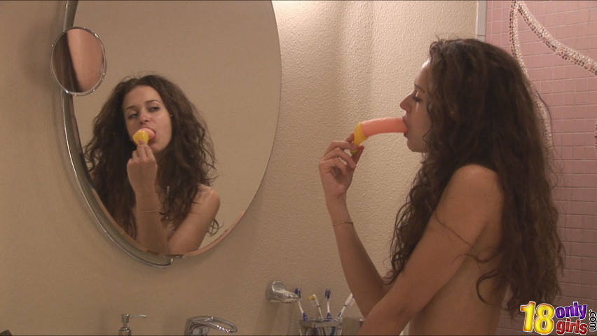 Teen playing with a banana shaped dildo #79005423