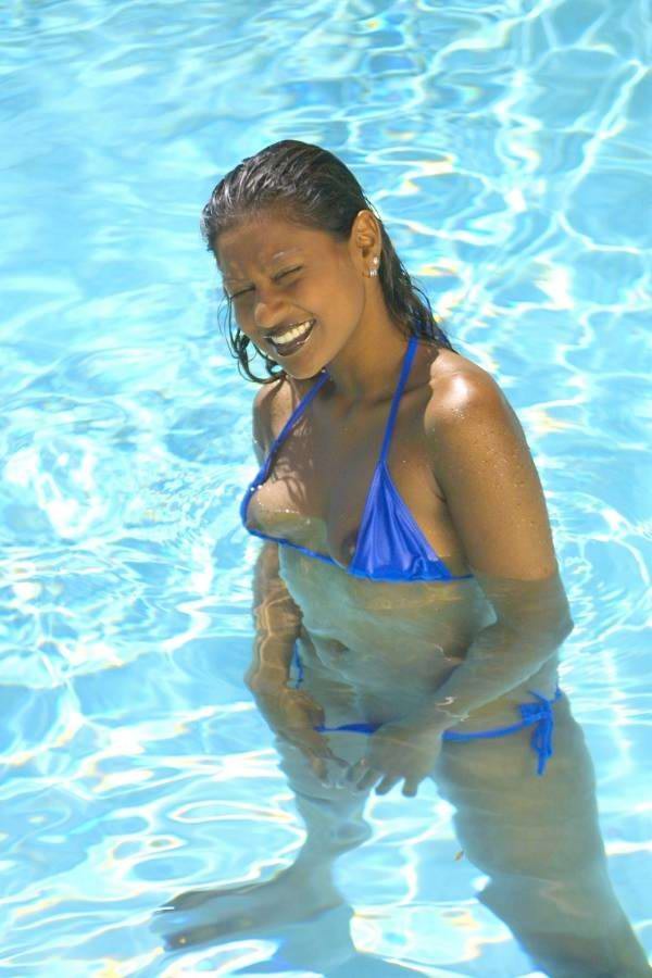 Sexy Indian girl in a thong bikini at the pool #73185605