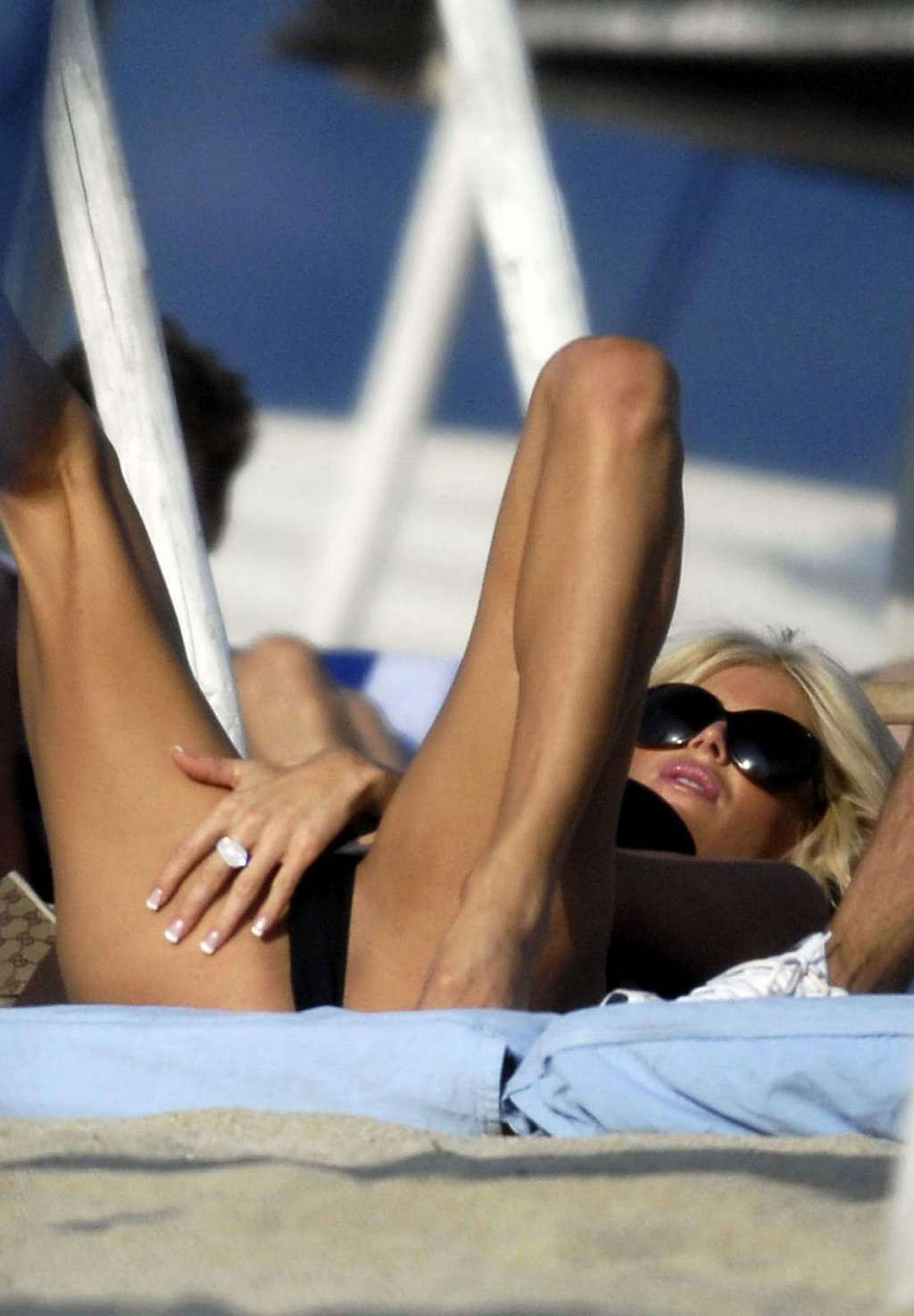 Victoria Silvstedt spread her legs on the beach and shows her sexy ass #75376588