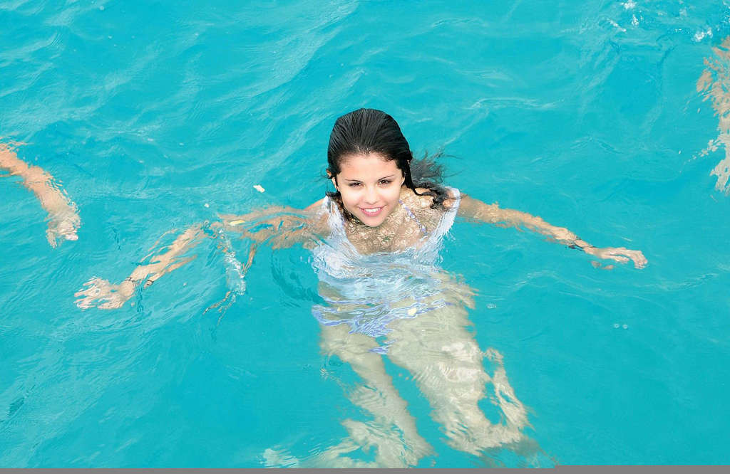 Selena Gomez showing sexy body and hot ass in bikini on yacht #75334210