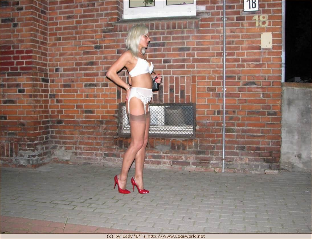 Amateur german babe in stockings posing in public #78481284