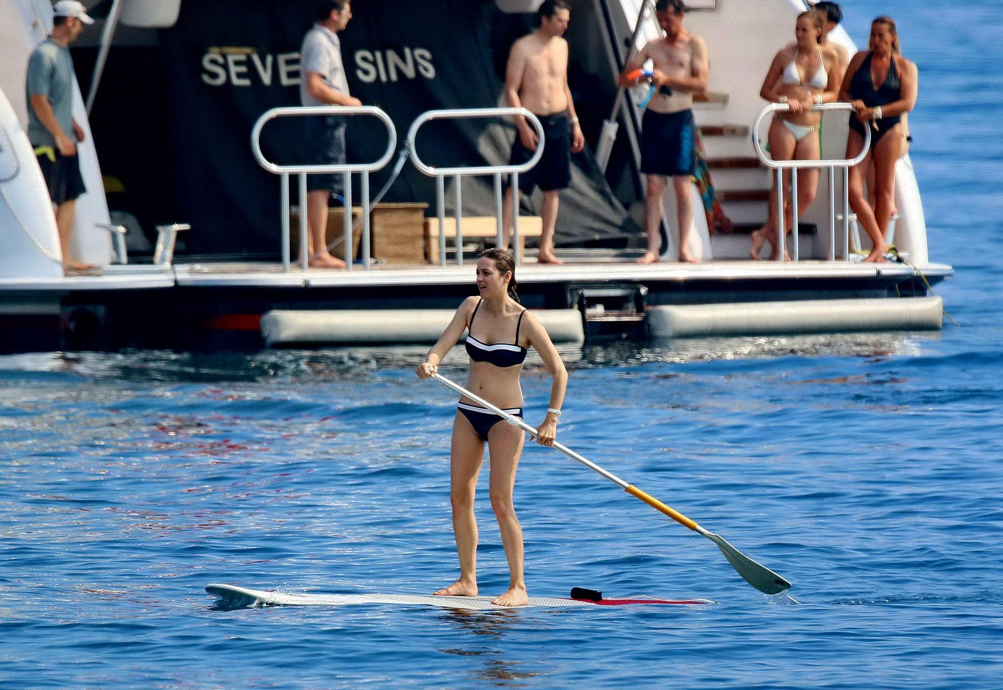 Marion Cotillard paddle boarding in a twotoned bikini #75188354