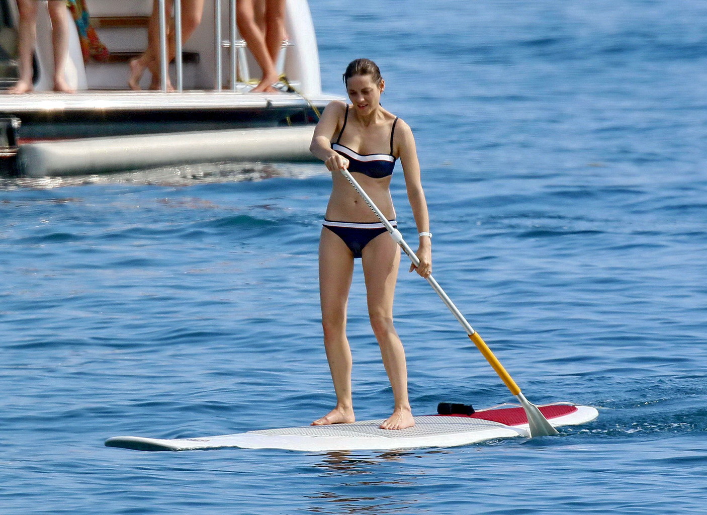 Marion Cotillard paddle boarding in a twotoned bikini #75188363
