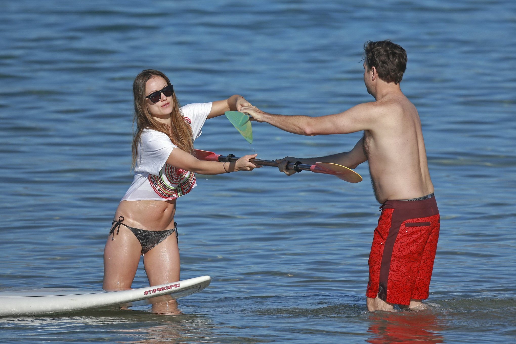 Olivia Wilde showing her ass in tiny monochrome flower print bikini while paddle #75179003