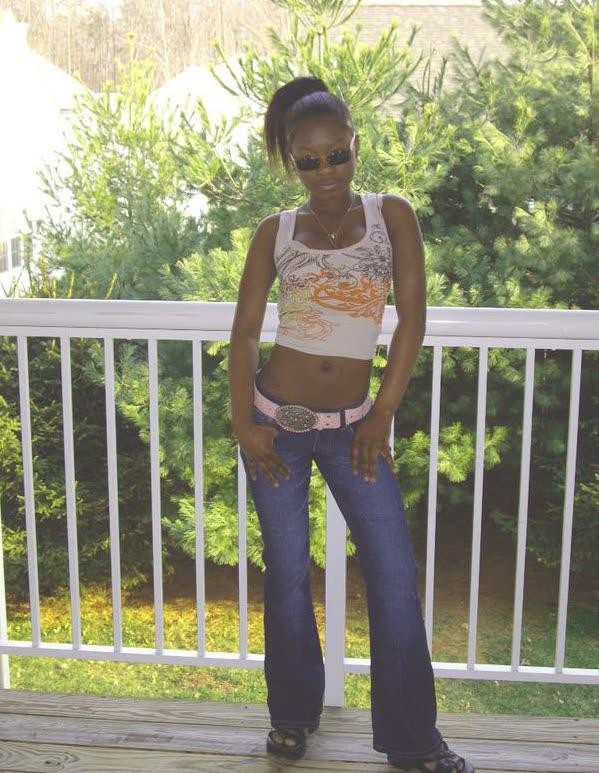 Ebony teen chick flaunts tight body while posing in different ou #67305428