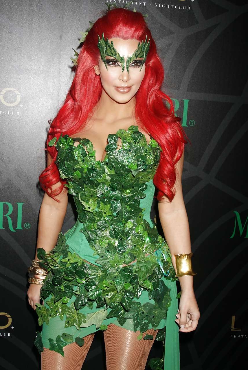 Kim Kardashian as redhair in Poison Ivy costume for Helloween party #75284023