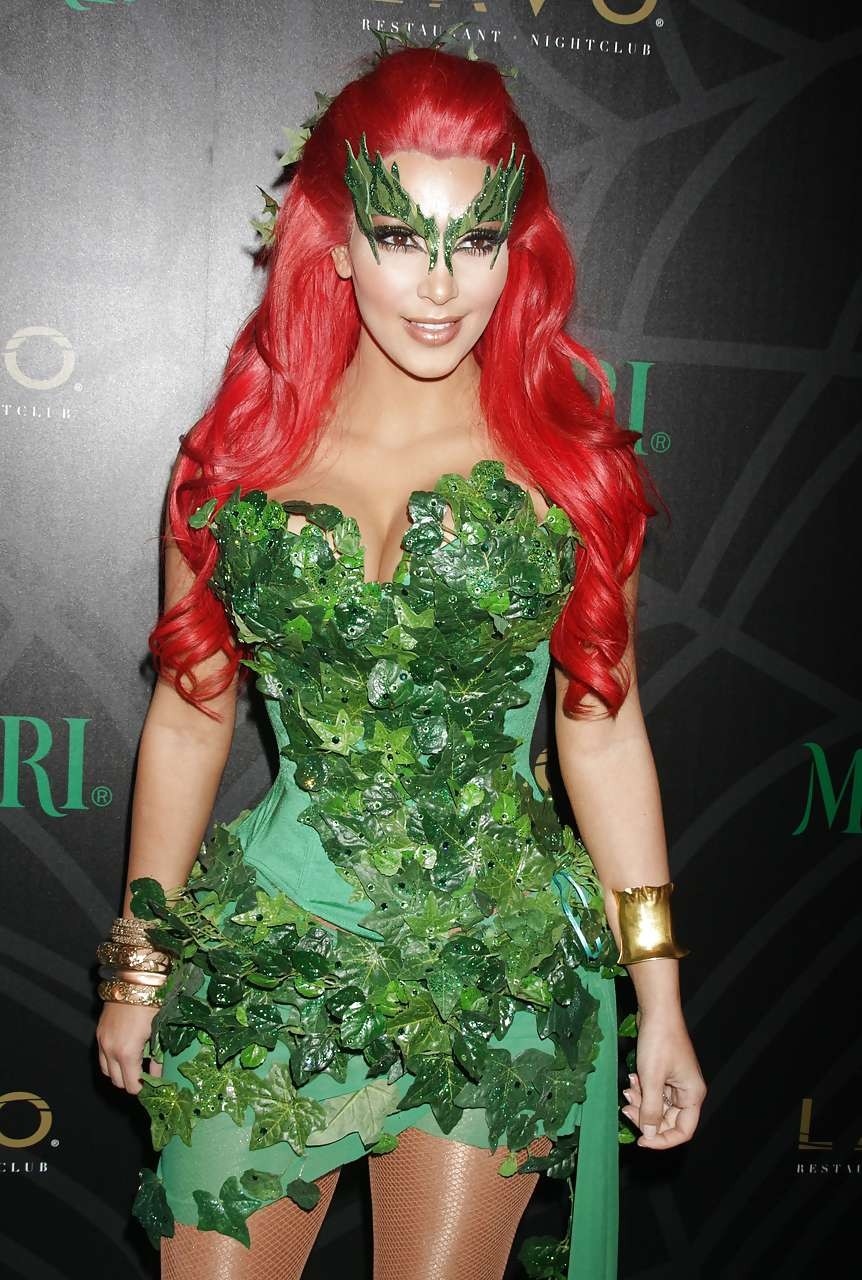 Kim Kardashian as redhair in Poison Ivy costume for Helloween party #75284032