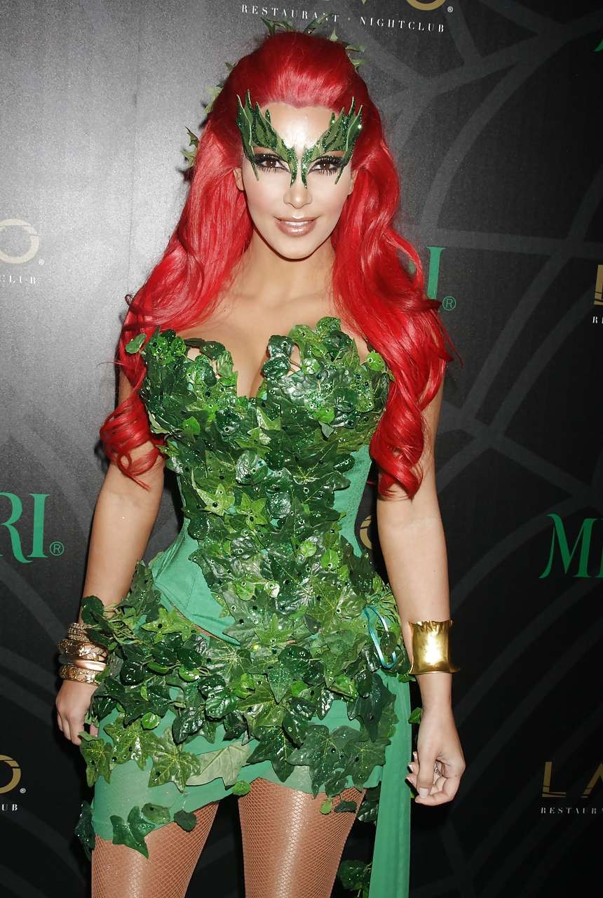 Kim Kardashian as redhair in Poison Ivy costume for Helloween party #75284039