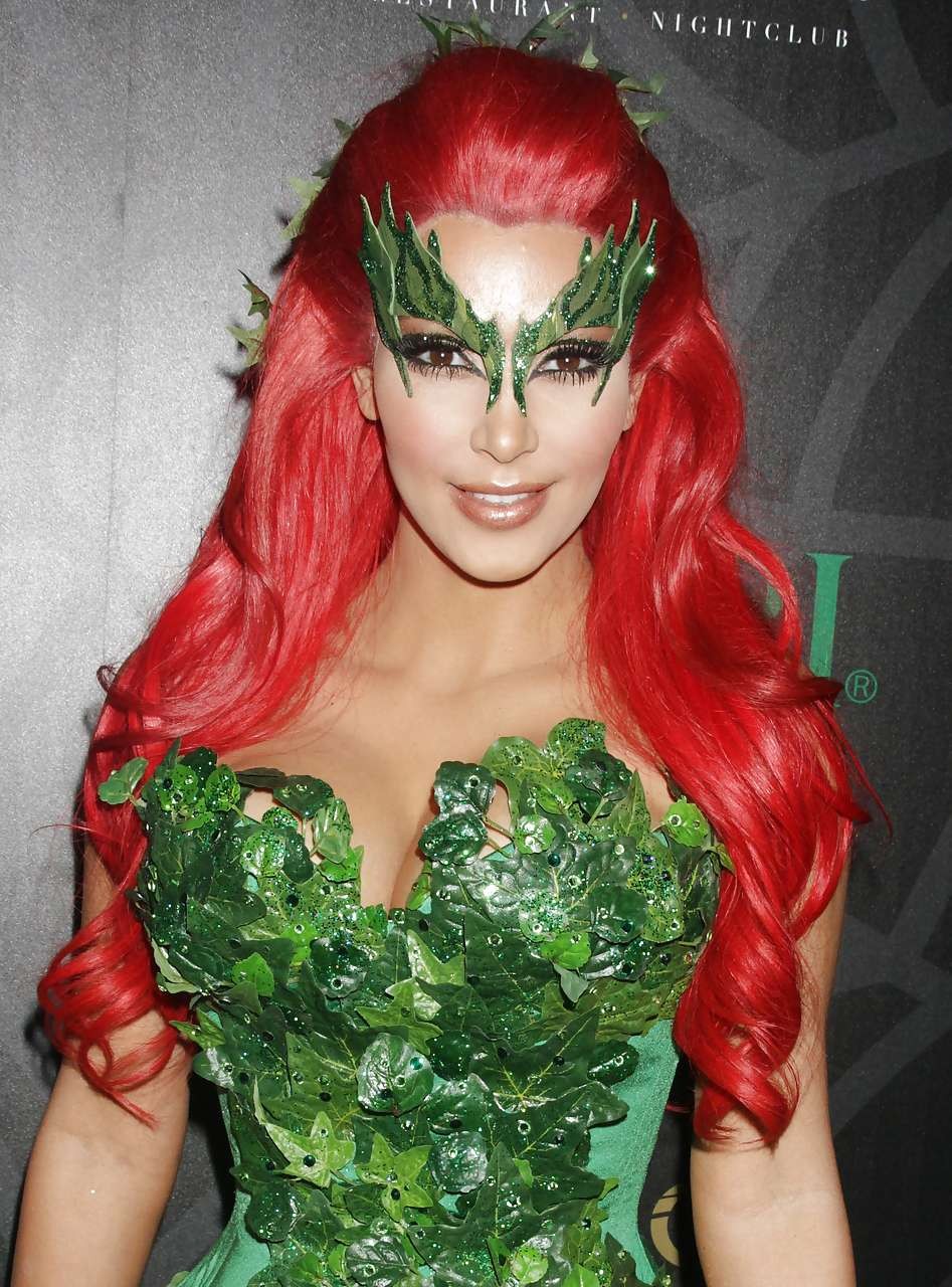 Kim Kardashian as redhair in Poison Ivy costume for Helloween party #75284046