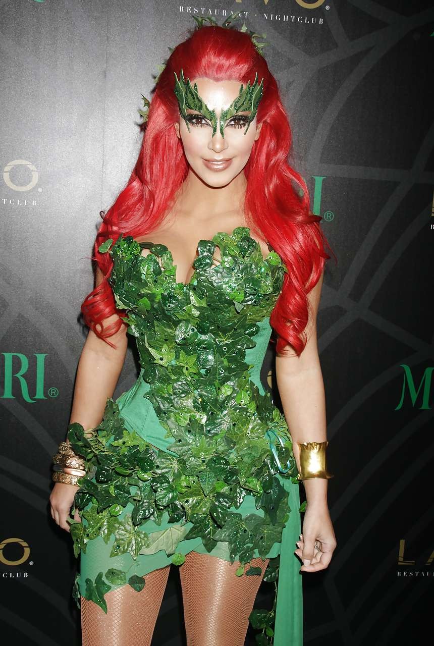 Kim Kardashian as redhair in Poison Ivy costume for Helloween party #75284071
