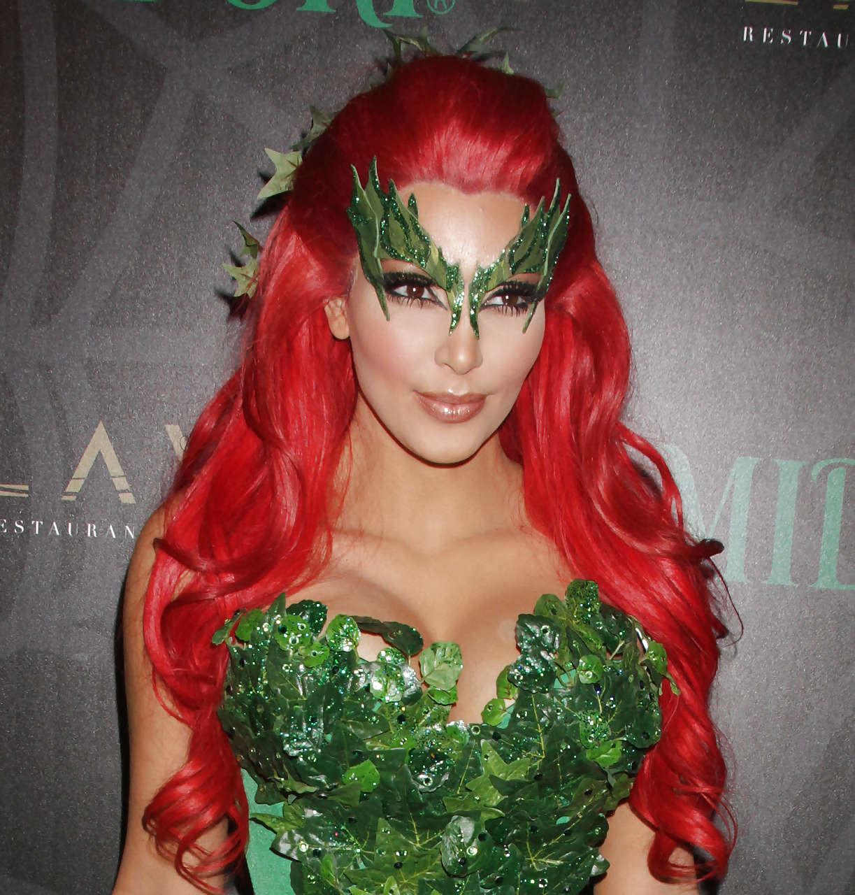 Kim Kardashian as redhair in Poison Ivy costume for Helloween party #75284138