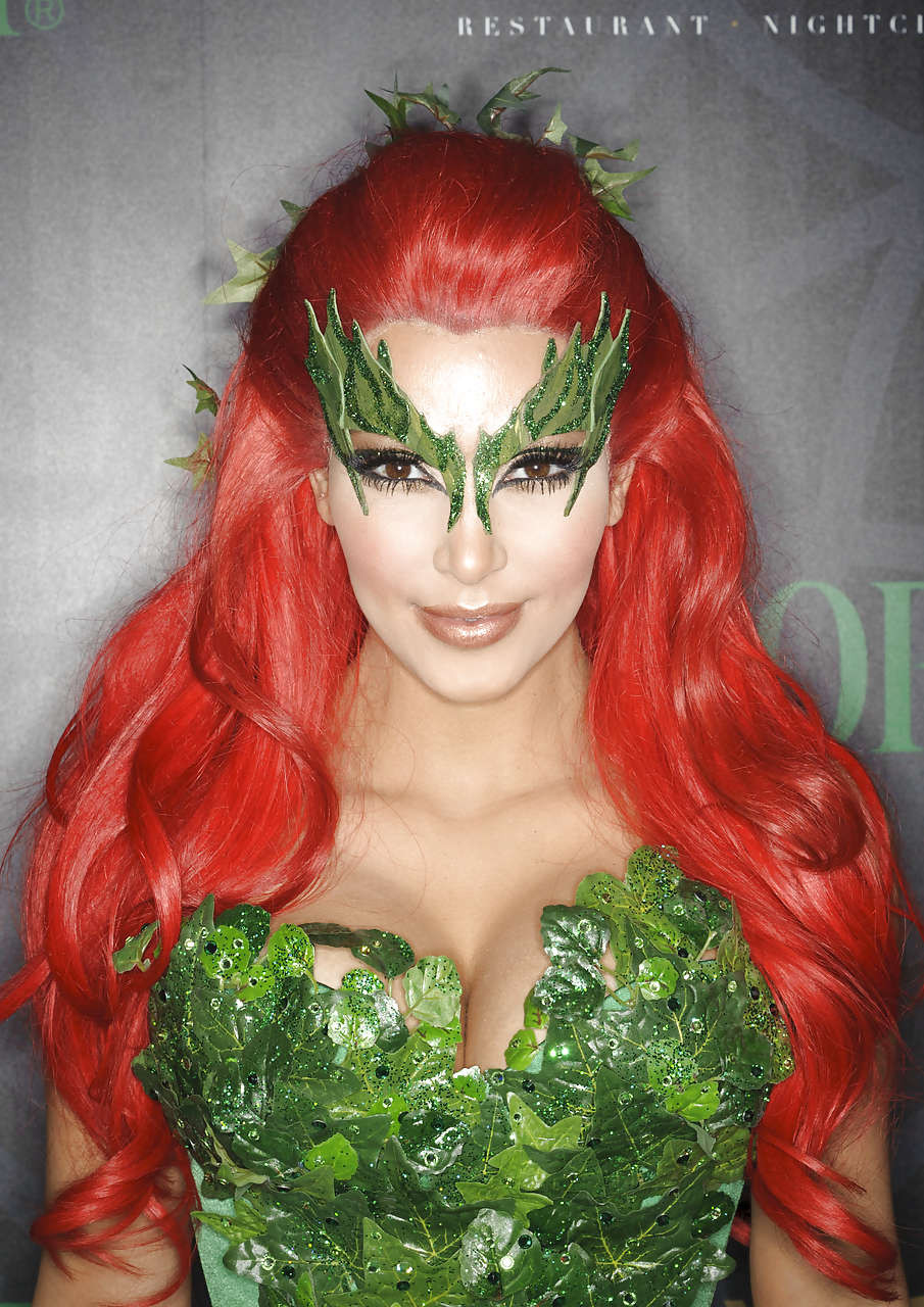 Kim Kardashian as redhair in Poison Ivy costume for Helloween party #75284144