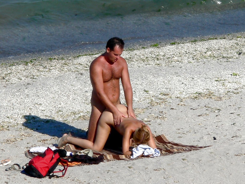 Sexy amateur girl licking cock on a public beach #72241620