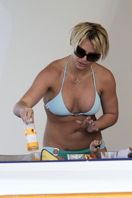 Britney Spears caught tanning deep cleavage #75366947