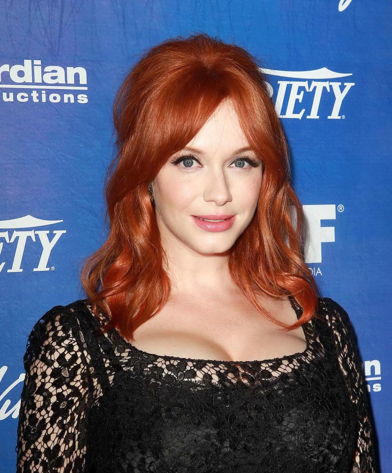 Christina Hendricks shows cleavage wearing a black lace dress at Variety Pre-EMM #75252193