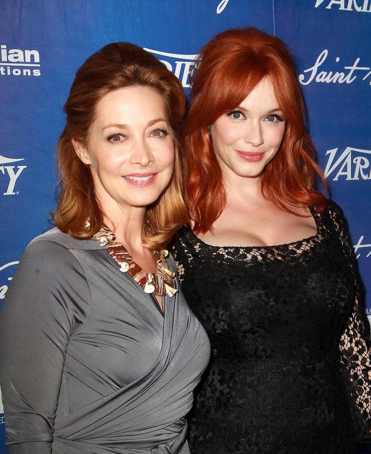 Christina Hendricks shows cleavage wearing a black lace dress at Variety Pre-EMM #75252221