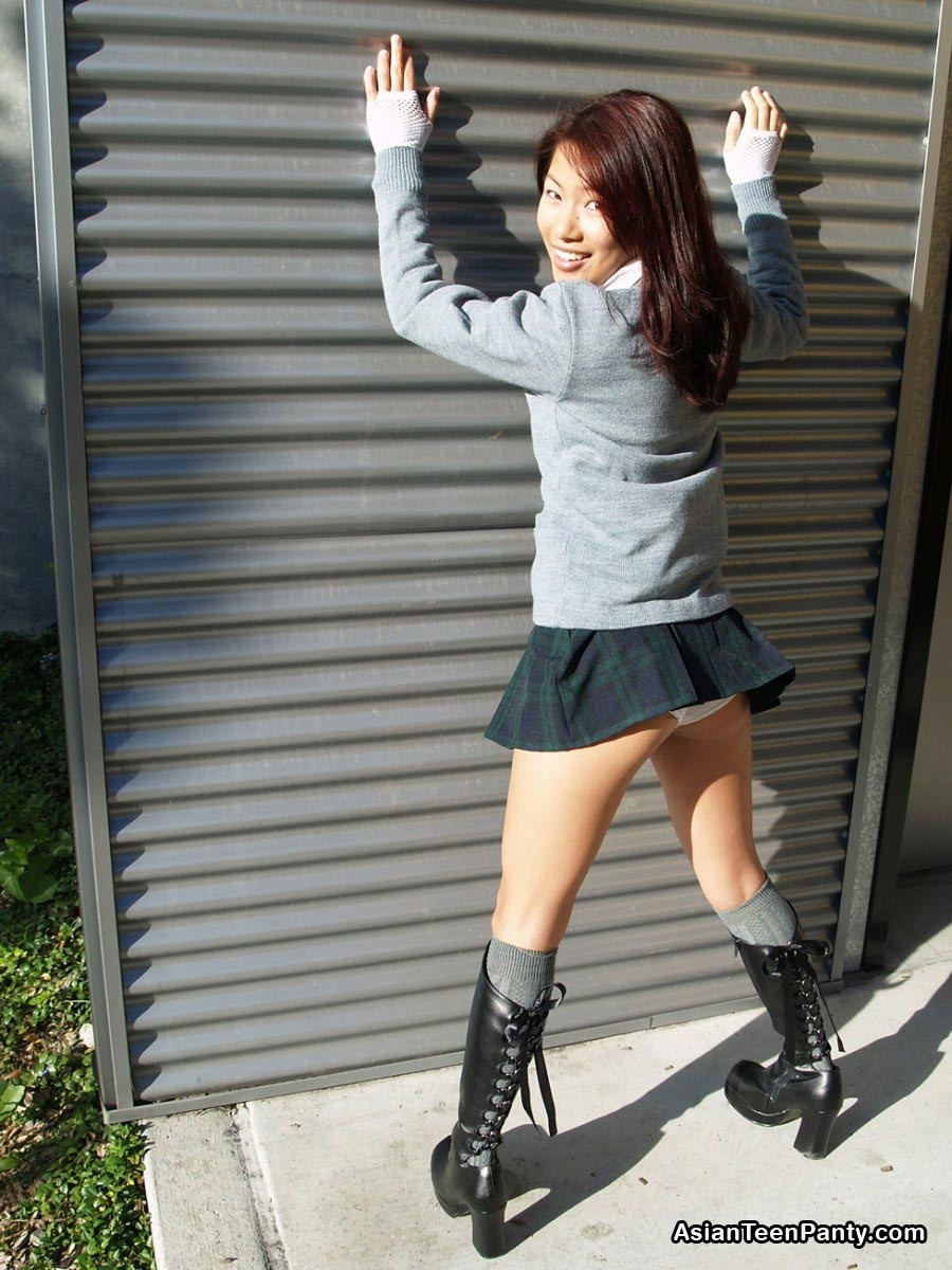 Asian schoolgirl outdoors #69974021