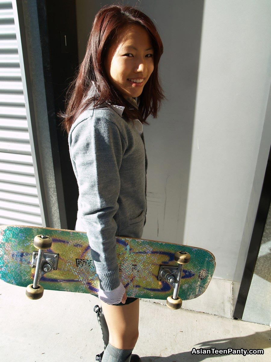 Asian schoolgirl outdoors #69974041
