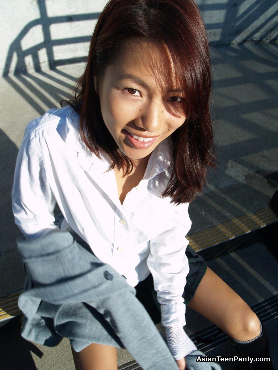 Asian schoolgirl outdoors #69974104