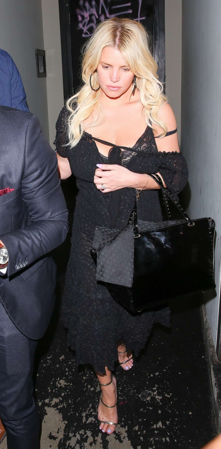 Jessica simpson wardrobe malfunction while stumbling out of sayers club in holly
 #75162351