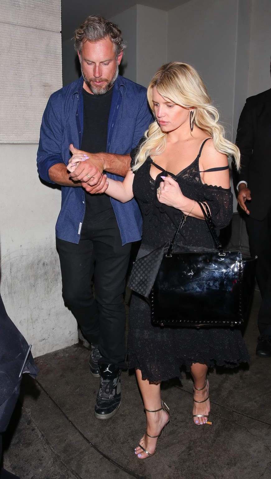 Jessica simpson wardrobe malfunction while stumbling out of sayers club in holly
 #75162369