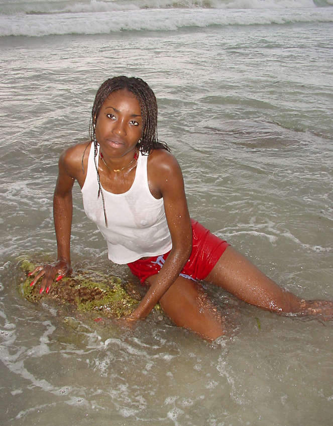 Horny ebony girl naked at the beach #73429040