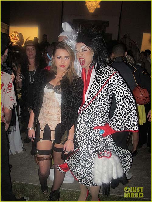 Miley Cyrus exposing sexy body and huge boobs on halloween party #75283639