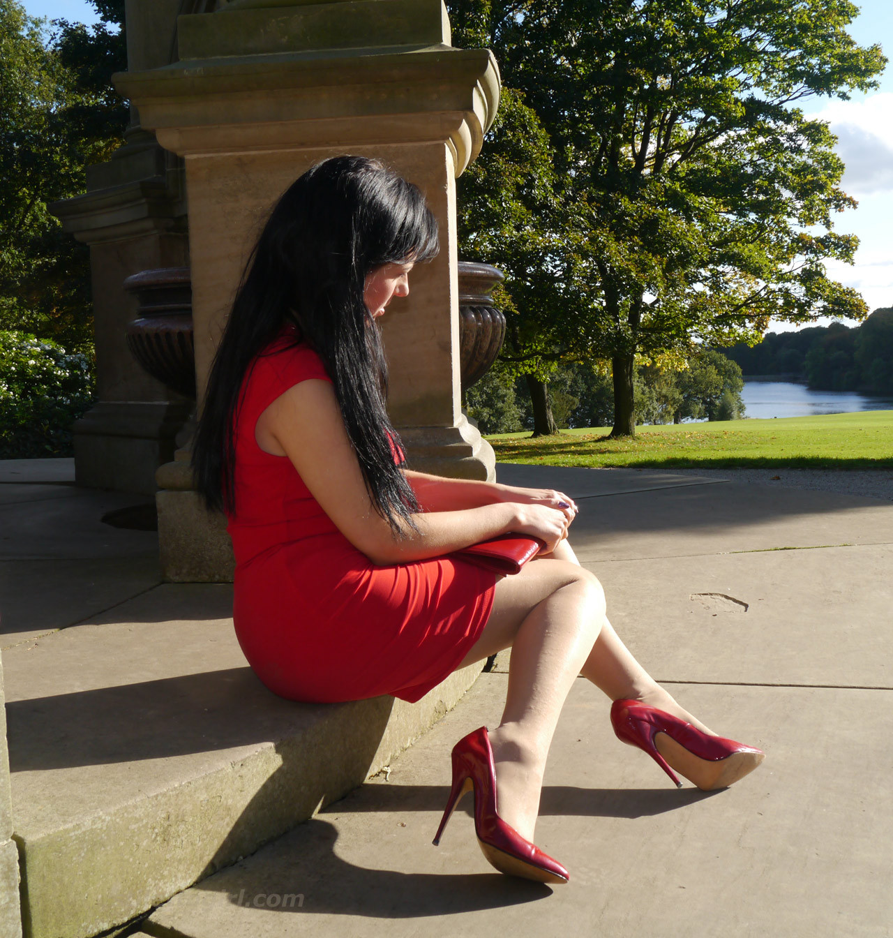 Sexy babe with shoe fetish takes a stroll outdoors wearing a tight red dress wit #74637492