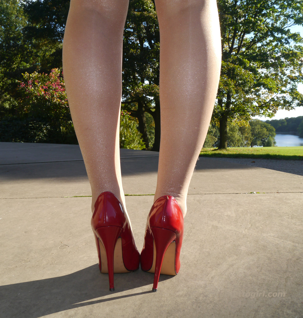 Sexy babe with shoe fetish takes a stroll outdoors wearing a tight red dress wit #74637592