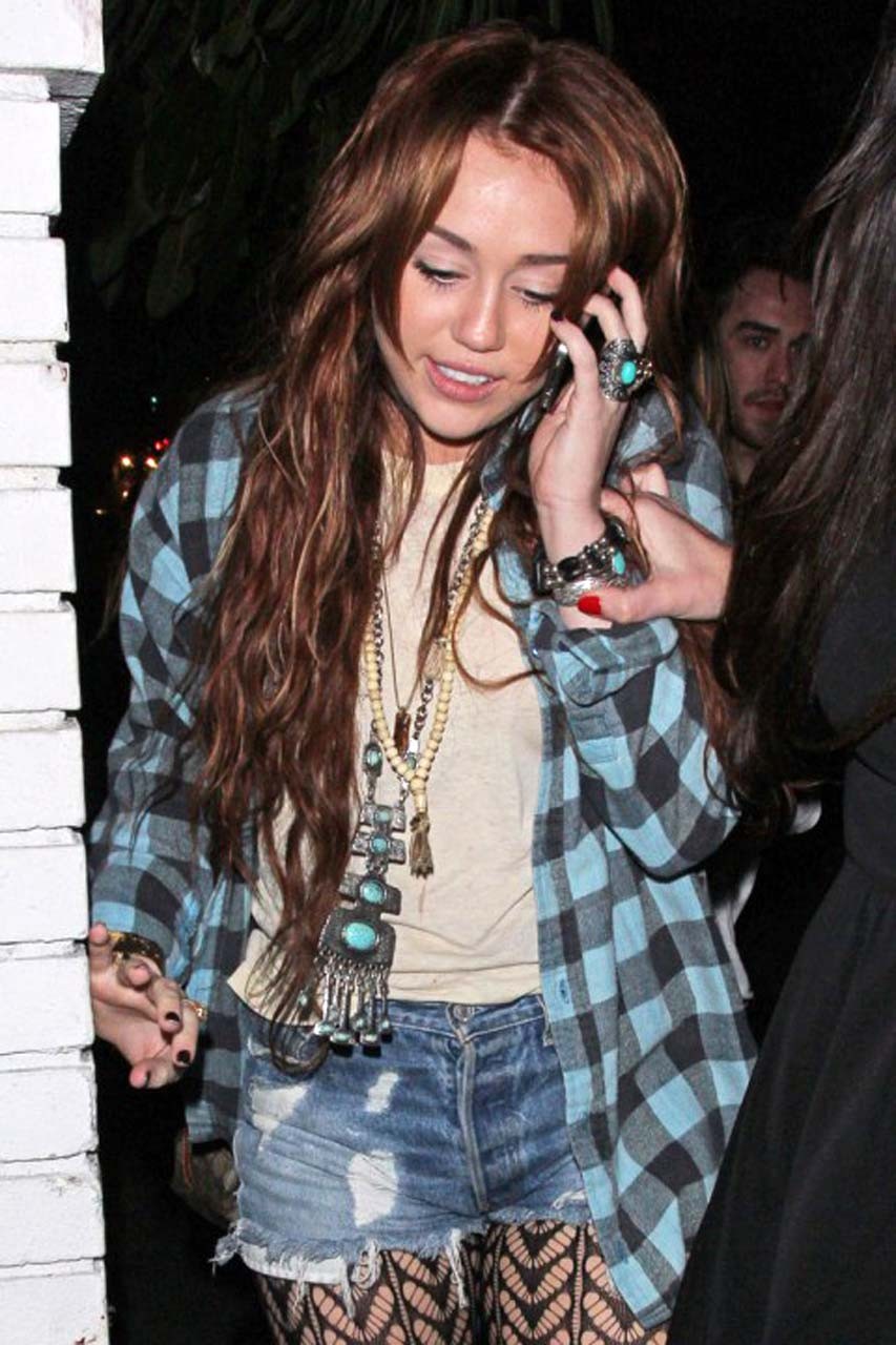 Miley Cyrus looking very drunk and showing tattoo under her tits #75313233