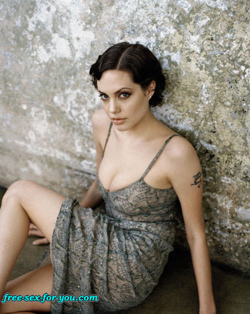 Angelina Jolie posing very sexy and showing her tatoo #75426212