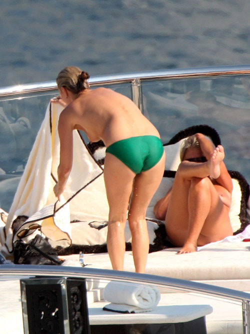 Kate Moss showing her nice tits on beach paparazzi pictures #75396447