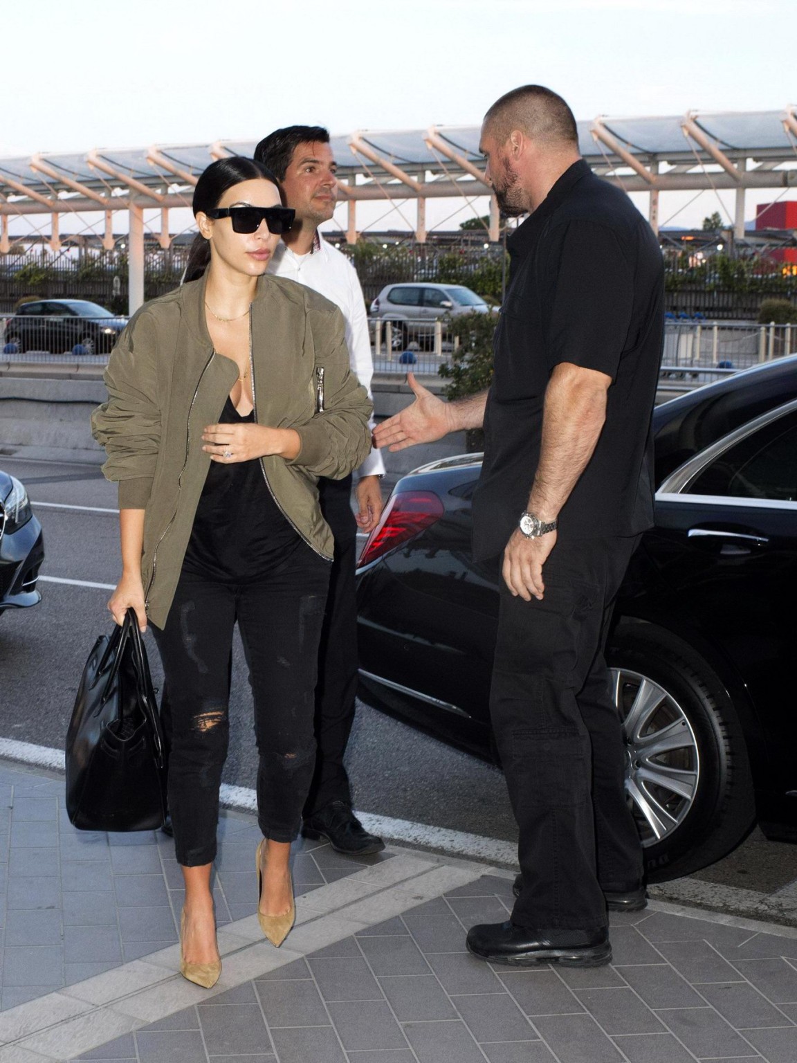 Kim Kardashian showing huge cleavage at Nice Airport in France
