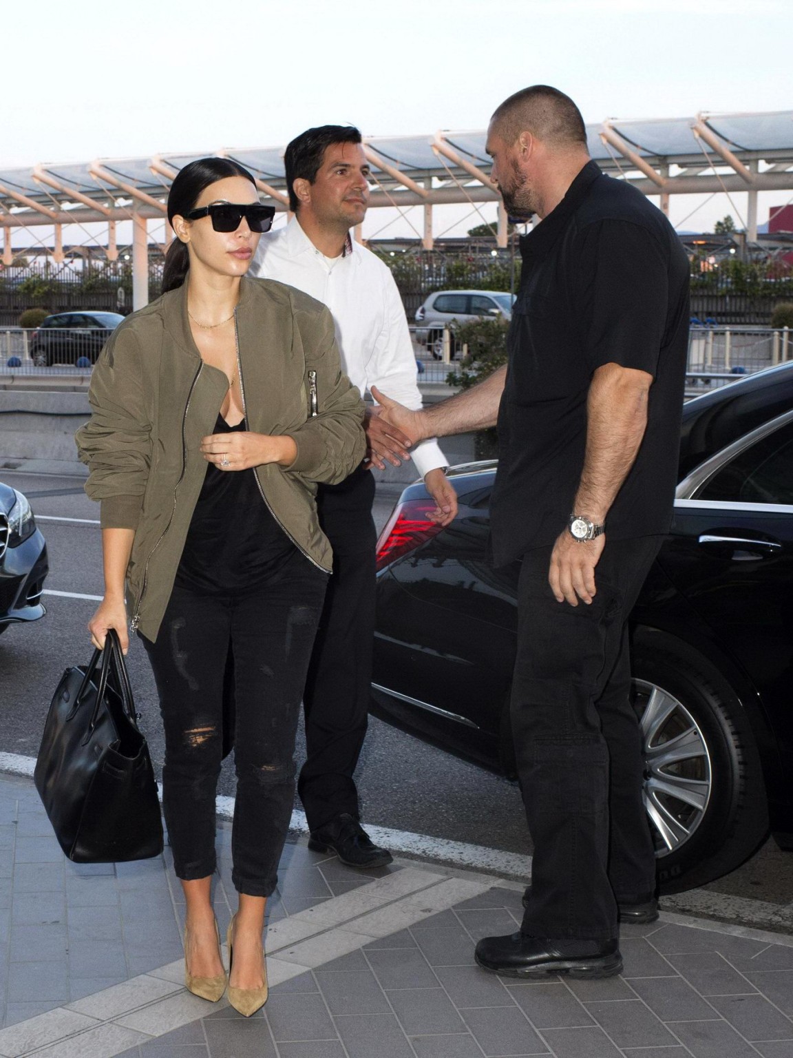 Kim Kardashian showing huge cleavage at Nice Airport in France #75192718