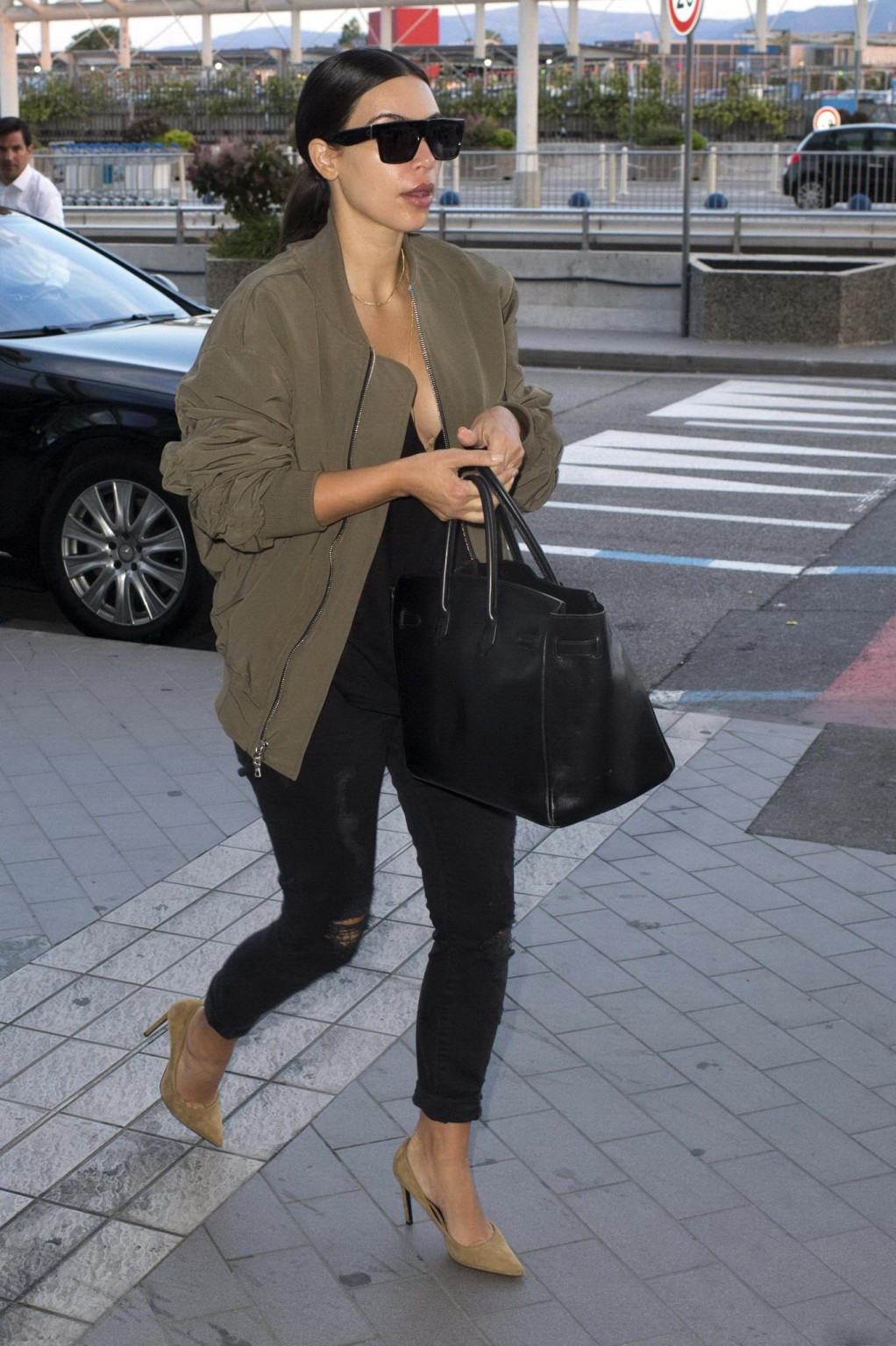 Kim Kardashian showing huge cleavage at Nice Airport in France #75192776