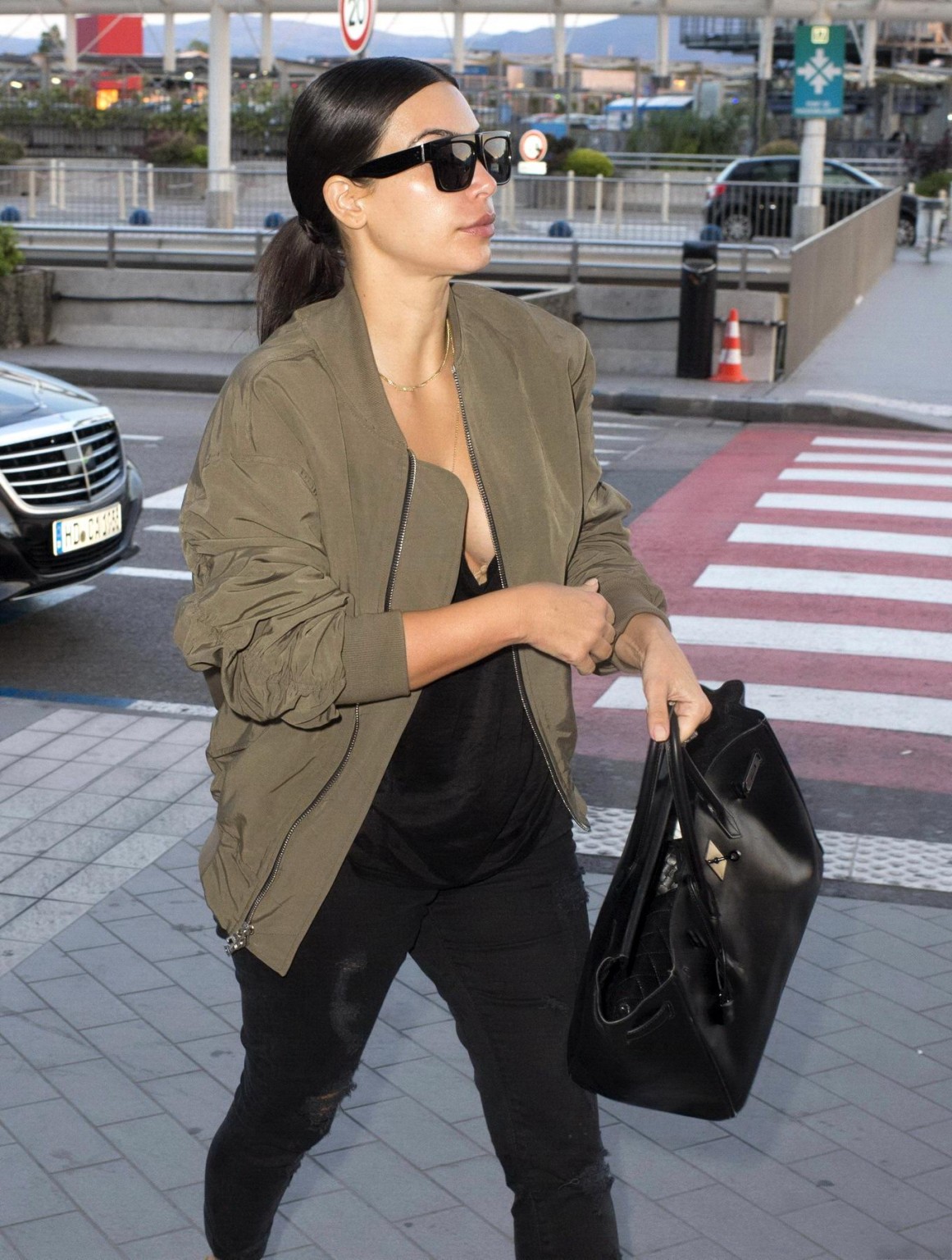 Kim Kardashian showing huge cleavage at Nice Airport in France #75192798