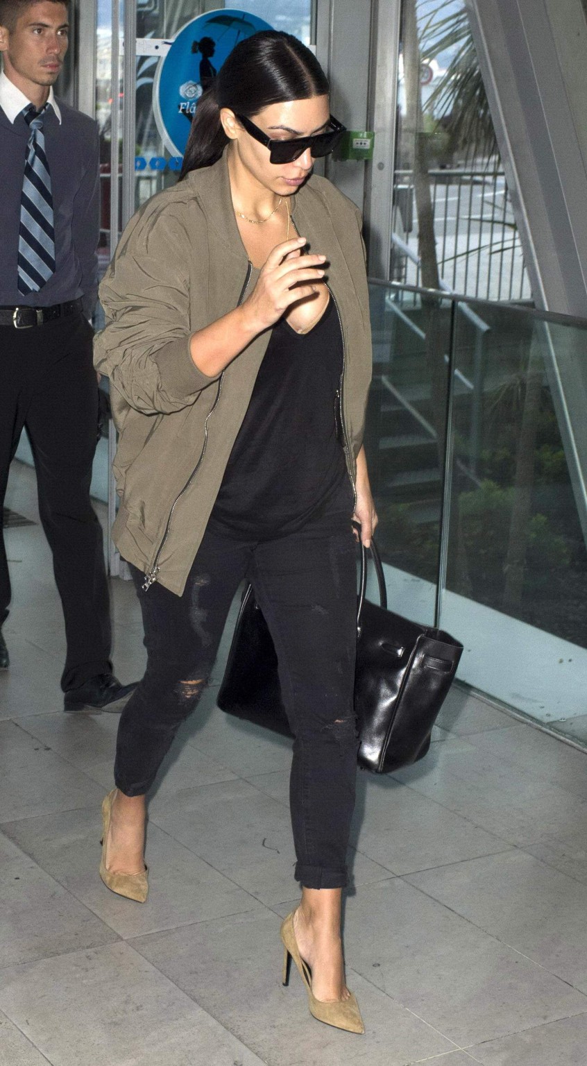 Kim Kardashian showing huge cleavage at Nice Airport in France #75192804