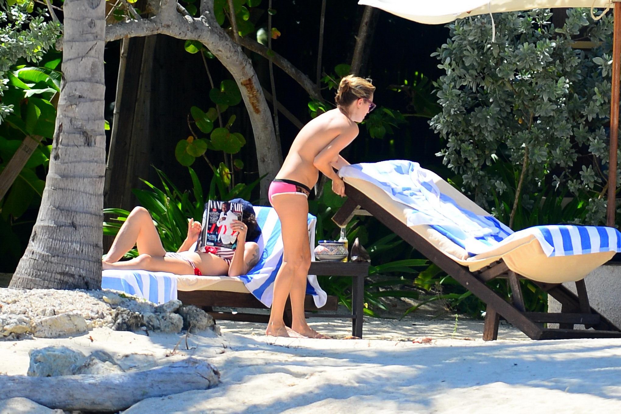 Kate Moss tanning topless on a beach in Jamaica #75215450