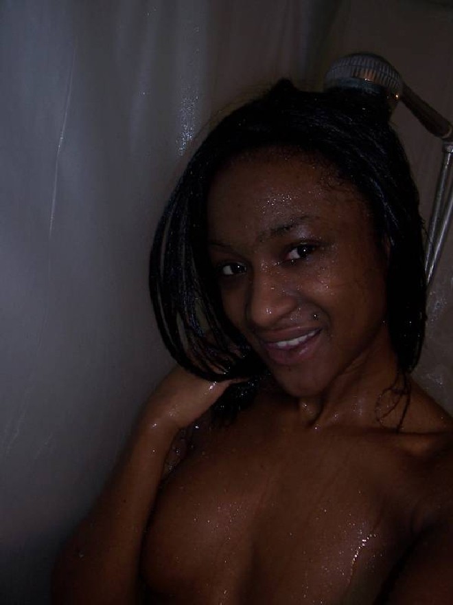 Horny black hottie taking wet and naked self shot pics in the shower #67340670