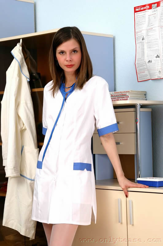 Sexy brunette teen posing in nurse uniform #75064692
