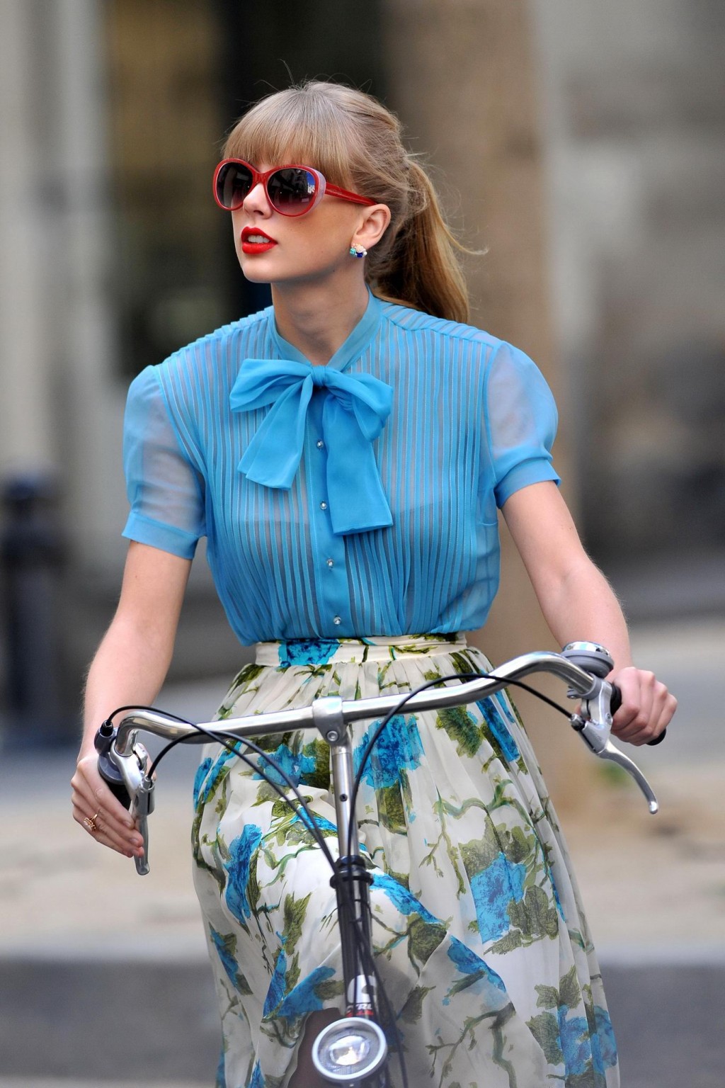 Taylor Swift see through to bra while riding a bike on the music video set #75251535