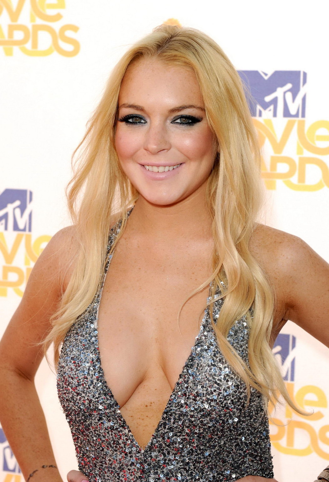 Lindsay Lohan braless showing huge cleavage at MTV Movie Awards #75346503