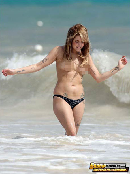 Model Peaches Geldof caught topless on the beach #75167358