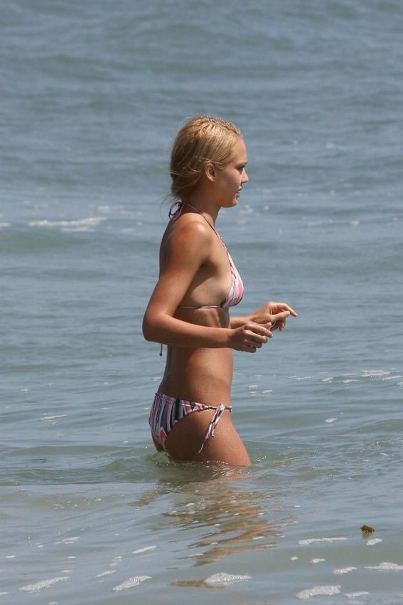 Jessica Alba bending over at the beach in tiny bikini #75380759