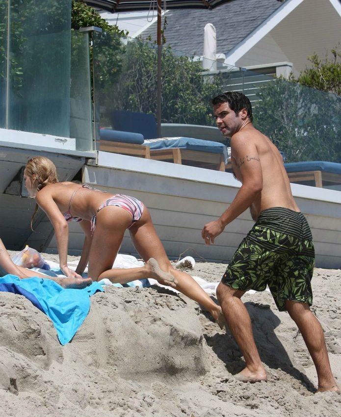 Jessica Alba bending over at the beach in tiny bikini #75380768